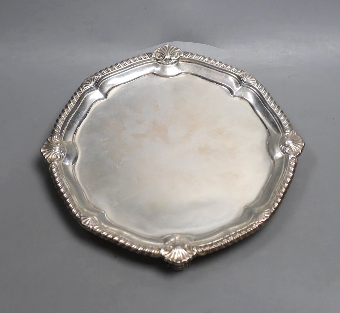 A George II silver salver, with gadrooned and shell border (foot repair), Edward Wakelin, London, 1752, 20.7cm, 15oz.